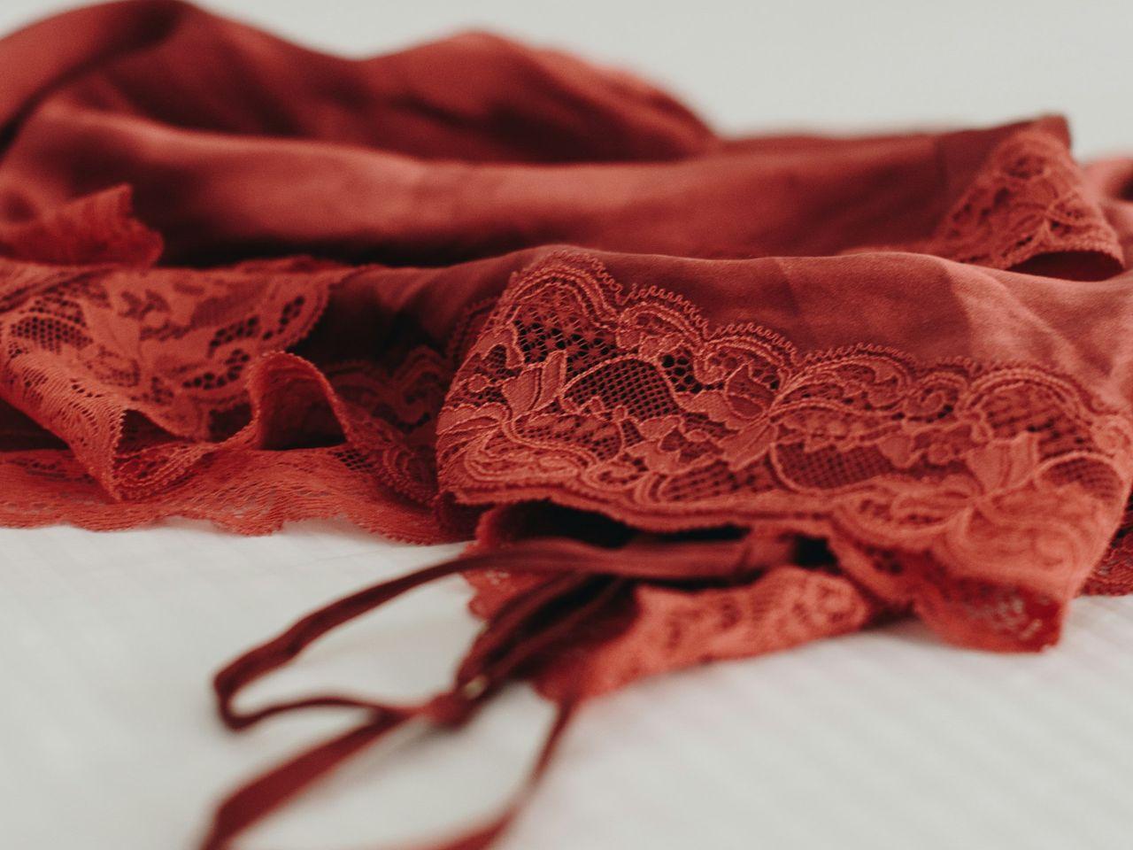 red and white floral textile