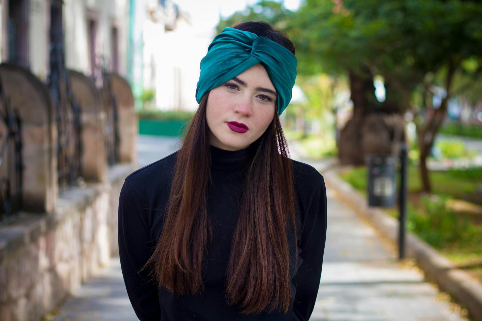 woman in black long sleeve shirt and blue hijab